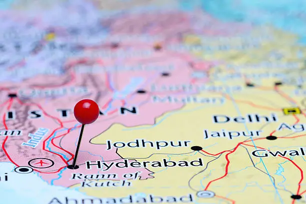 Photo of pinned Hyderabad on a map of Asia. May be used as illustration for traveling theme.