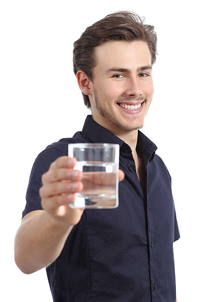 istock Happy man holding a glass with fresh water 488616558