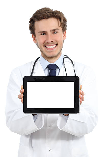 istock Happy doctor man showing a blank tablet screen software 488616624