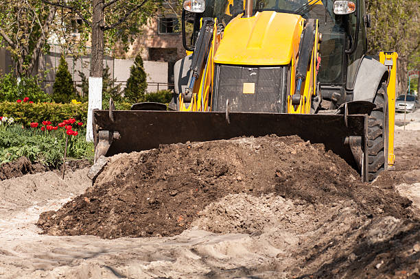 istock excavator works with the earth closeup 488622948