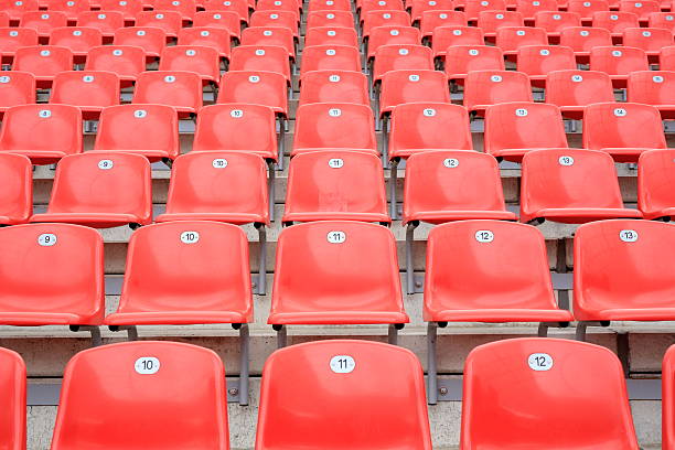 istock red seats in a soccer stadium 488623506