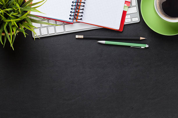 istock Desk with computer, supplies, coffee and flower 488623902