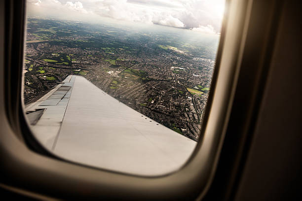 istock Airplane window during an international travel flight 488628254