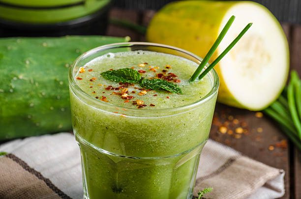 istock Cucumber smoothie with herbs and chili 488630330