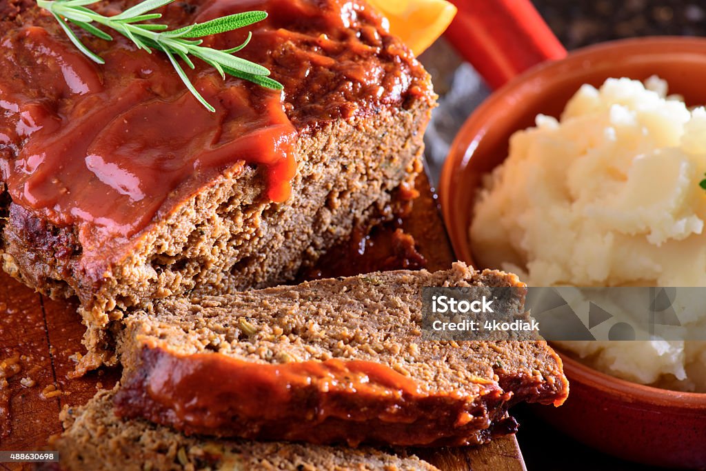 Fresh baked tomato glazed meatloaf served with mashed potato Homemade Meat loaf Meat Loaf - Food Stock Photo