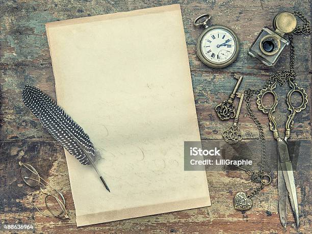 Letter Paper With Vintage Writing Tools Feather Pen And Inkwell Stock Photo - Download Image Now