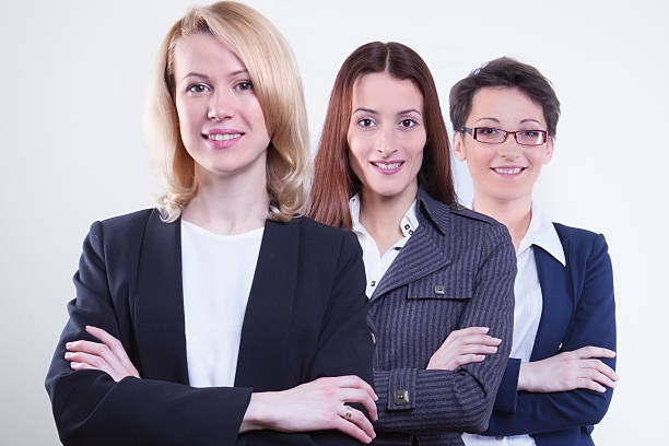 istock Smiling businesspeople standing together 488637786