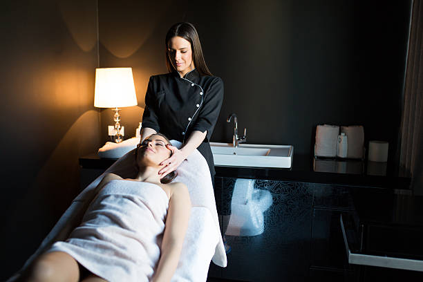 istock Young woman having a massage 488640234