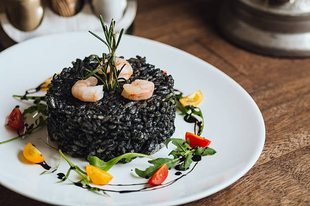 Black risotto close up stock photo