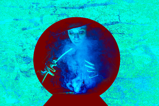istock Halloween:  Witch cooking her brew for special guests. Crystal ball. 488647510