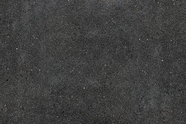 asphalte texture en arrière-plan. motif couleur noire sombre, l'asphalte. - macadam photos et images de collection