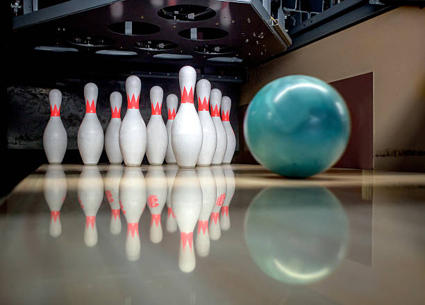 istock Bowling ball about ti hit the pins 488648824