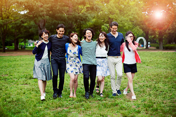 istock Young people walking in park in Tokyo. 488649524