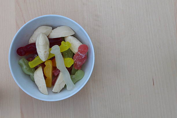 istock bowl of mixed sweets. 488649592