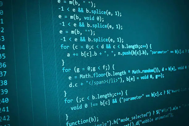 Software developer programming code on computer. Abstract computer script source code.