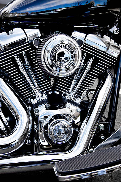 Harley Engine with skulls Bergen County, New Jersey, USA - May 4, 2014: Harley Davidson motorcycle engine with custom Harley skull medallions. Harley Davidson motorcycle engines are the model copied by other top motorcycle manufactures worldwide. harley davidson fat boy stock pictures, royalty-free photos & images