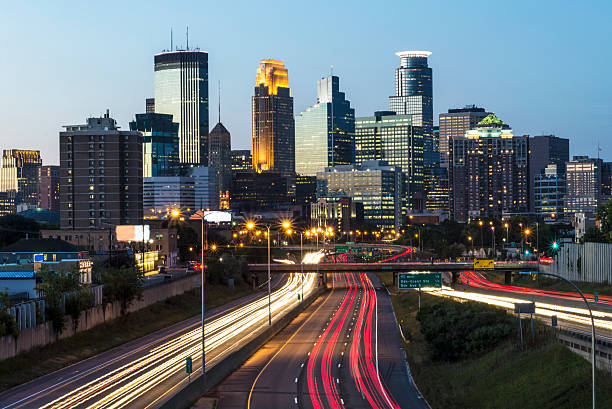 istock Minneapolis City Skyline and Traffic Light Tails 488652190