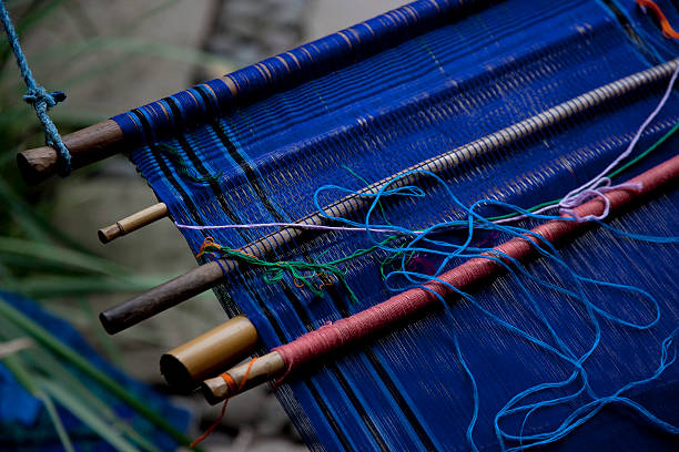 Traditional art of loom weaving in Guatemala stock photo