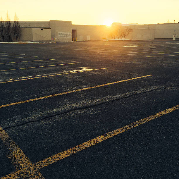 IKEA store sign and parking lot during a beautiful summer sunset in Montreal, Quebec.