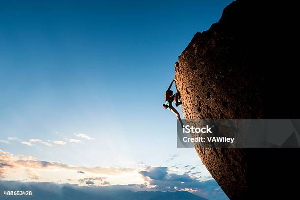 Athletic Female Rock Climber Stock Photo - Download Image Now - Mountain Climbing, Rock Climbing, Climbing