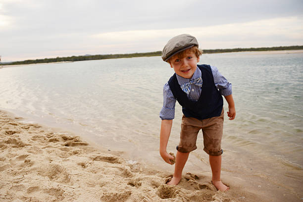 istock Little boy playing in the sand 488653886