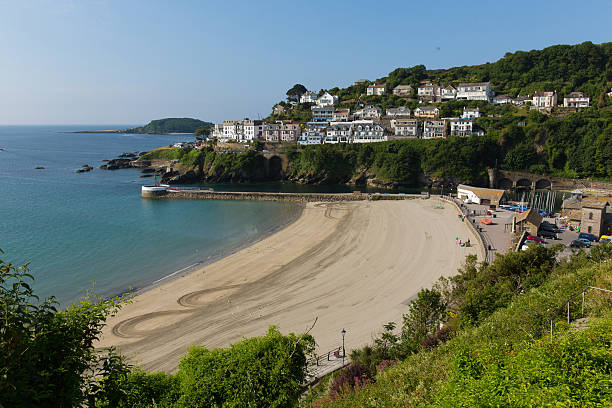 istock Looe beach Cornwall England with blue sea and sky 488653911