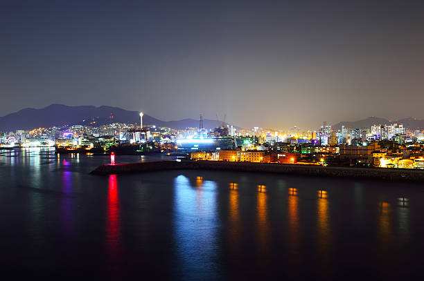 skyline at night with Seo-gu district in Busan, South Korea