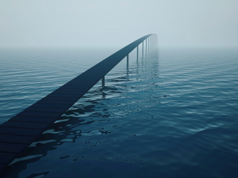 Narrow bridge over sea (risk concept)
