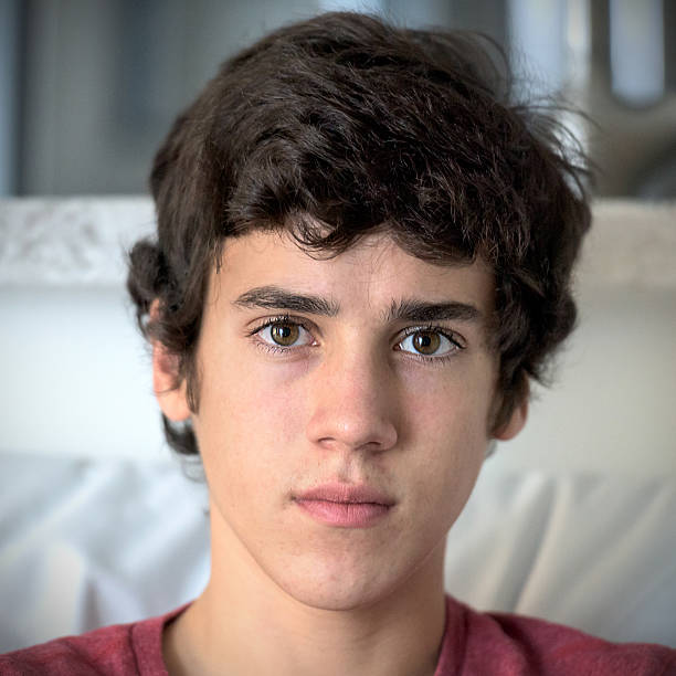 Seventeen years old teenage boy looking at the camera