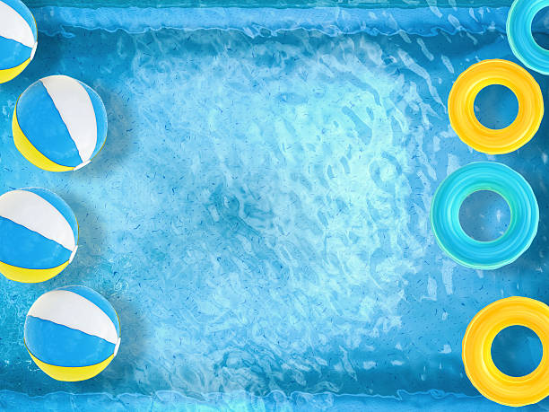 istock pool top view with swim rings and beach ball 488661660