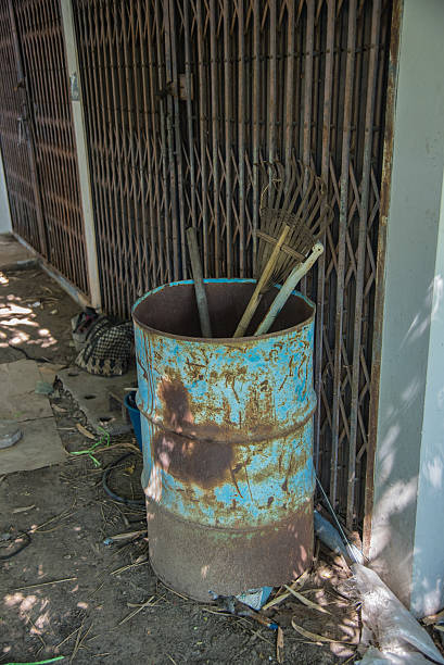 istock Old dirty cleaning brush hanging in tank 488663946