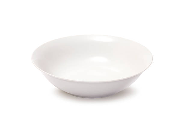 deep round white plate on a white background stock photo