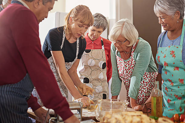 istock Showing them how to cut their kitchen time in half 488666376