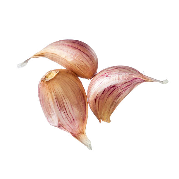 3 つのガーリッククローブ白背景 - garlic clove isolated white ストックフォトと画像