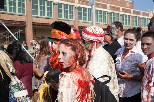 Asbury Park, New Jersey USA - October 5, 2013: Photos of Zombies walking on the boardwalk and through the streets of Asbury Park, New Jersey during the 2013 Asbury Park Zombie Walk.  This year they took back the Guinness Book of World Records record for the largest gathering of zombies!