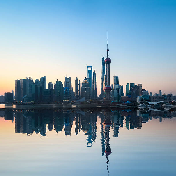 istock shanghai skyline in sunrise 488669507