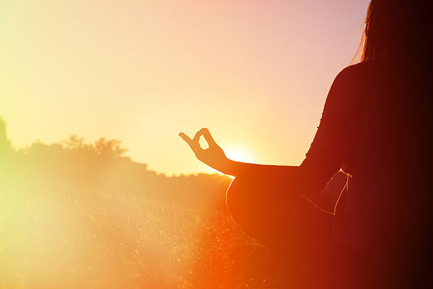 istock serenity and yoga practice in autumn at sunset 488673772