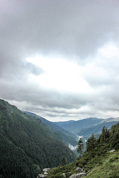 istock Fog over highway to mountains. Transfagarasan road. Romania 488678774