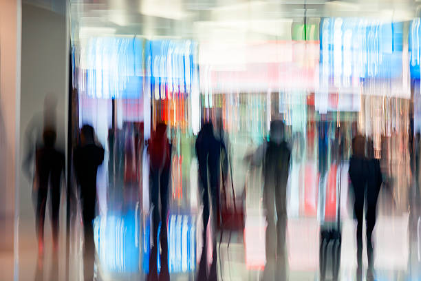 istock Motion Blurred Travellers Rushing at Airport 488688328