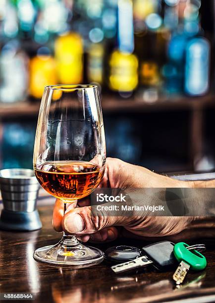 Cognac Or Brandy Hand Man The Keys To The Car Stock Photo - Download Image Now - 2015, Abuse, Addiction