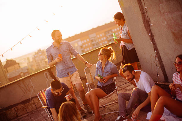 istock Casual party on the roof 488688624