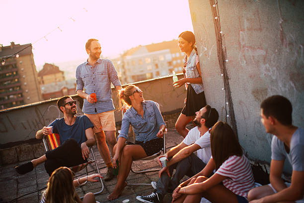 istock Casual party on the roof 488688986