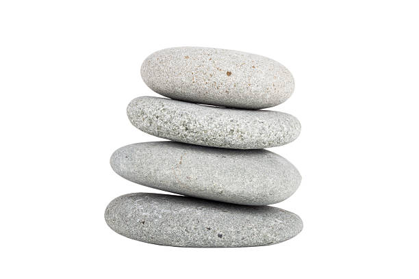 istock Stack of gray round stones is isolated on white background 488689282