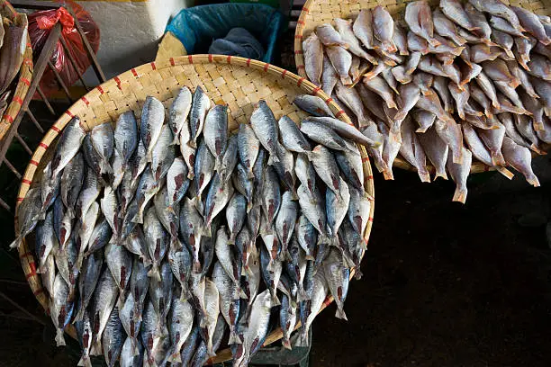 Raw dried seafish on market street