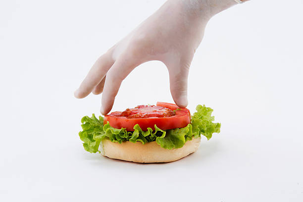 Making a hamburger stock photo