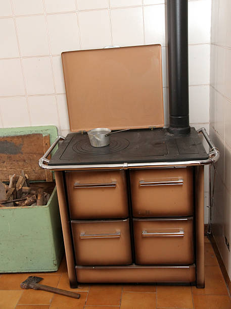 istock wood burning stove in a kitchen 488691679