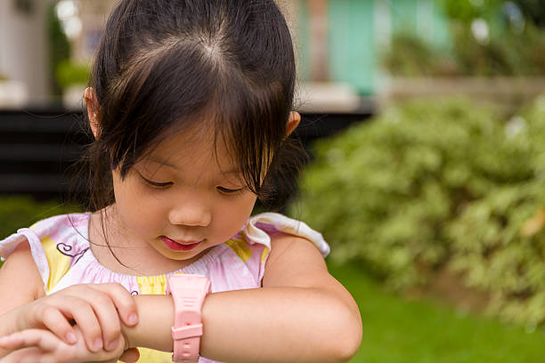 istock Child Using Smartwatch or Smart Watch / Child with Smartwatch 488692106