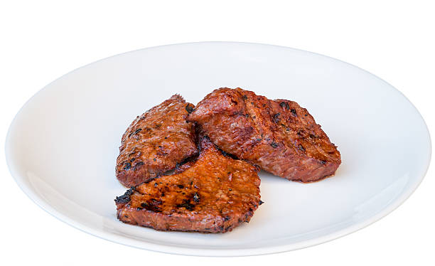 Grilled beef on a white plate stock photo
