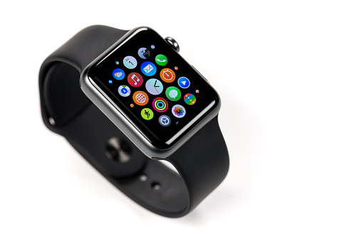 Koszalin, Poland - July 22, 2015:  A black 42mm stainless steel Apple Watch witch sports band. Apple Watch is a smart watch, developed by Apple Inc.
