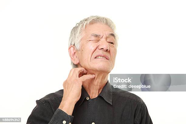 Senior Japanese Man Scratching His Neck Stock Photo - Download Image Now - Scratching, Men, Senior Adult